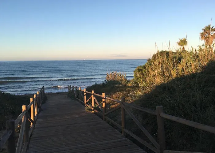 Deluxe In Royal Cabopino Townhouse Проживання в сім'ї Марбелья